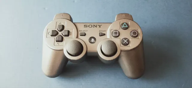 2 mandos PS3 Sony plata oscuro  metalizado + azul