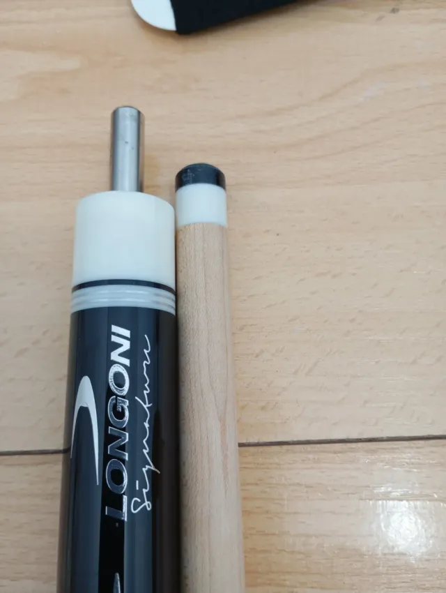 Taco de billar tres bandas