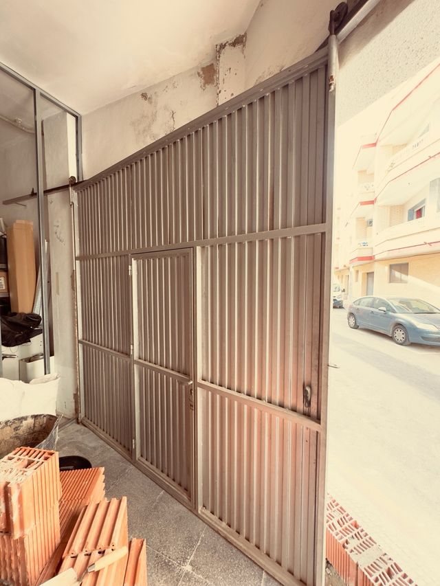 Puerta corredera garaje acero 250x250