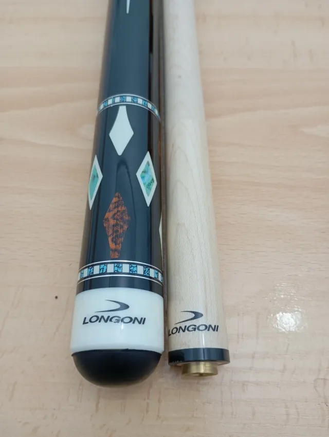 Taco de billar tres bandas