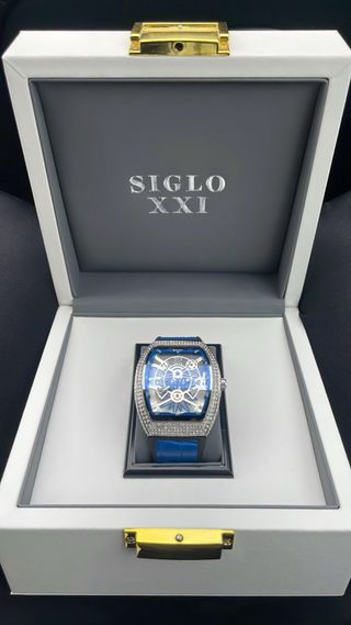 Reloj SIGLO XXI con detalles plateados