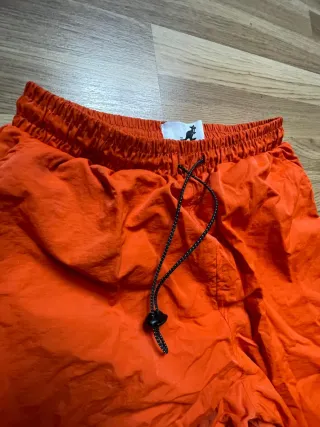 Pantalones parachute retro Kangol talla XS