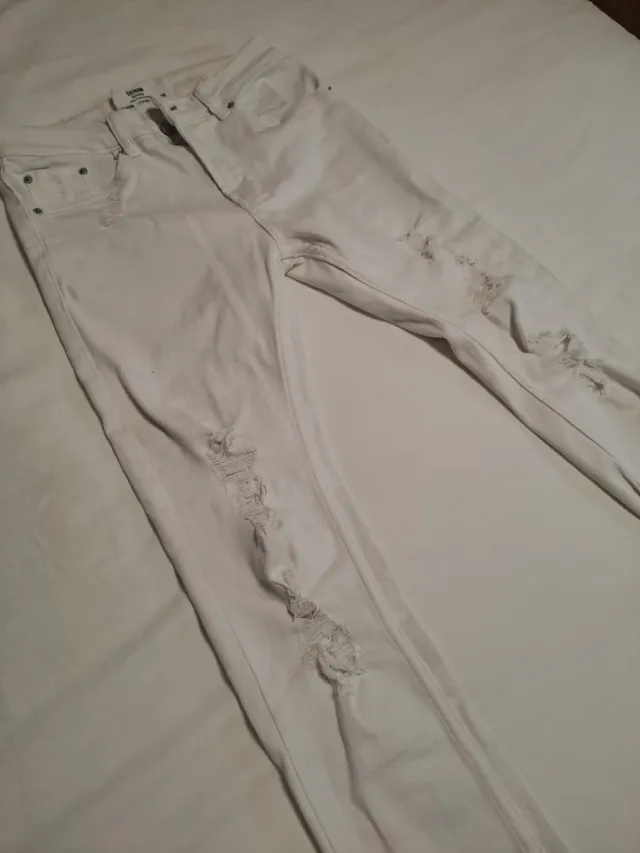 Pantalones vaqueros blancos rotos largos