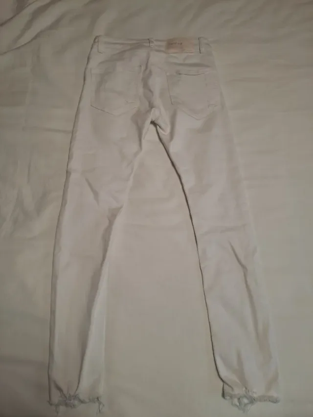 Pantalones vaqueros blancos rotos largos