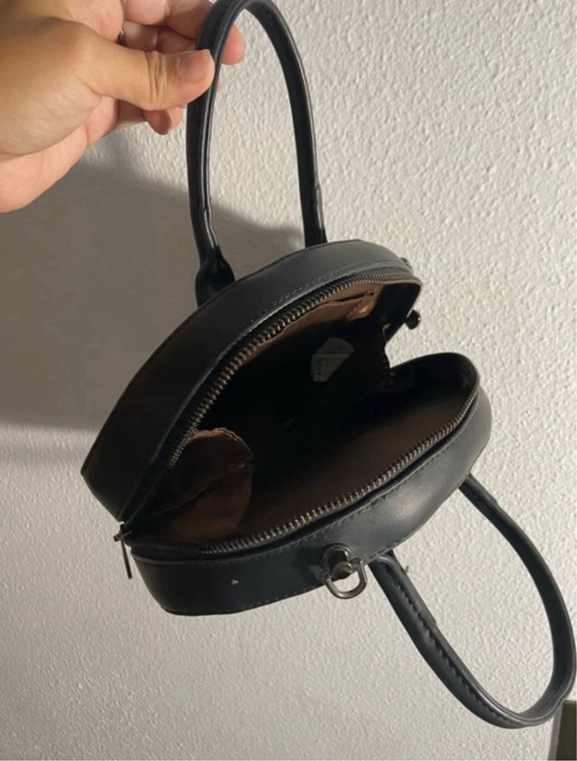 Bolso redondo negro