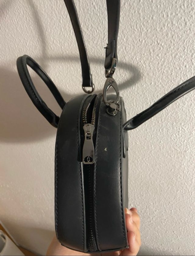 Bolso redondo negro