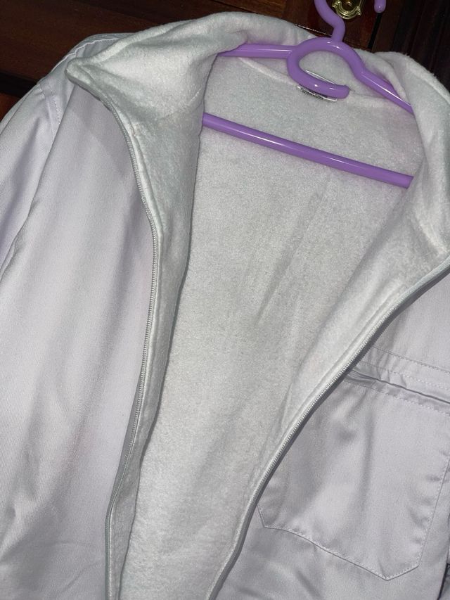 Cappotto bianco con fodera in pelliccia