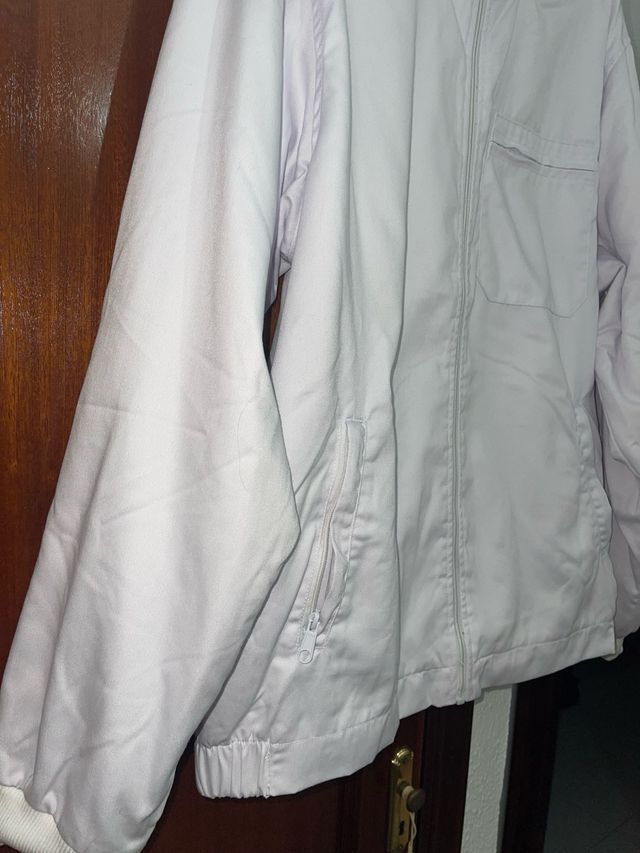 Cappotto bianco con fodera in pelliccia