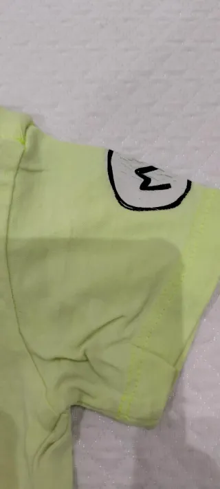 Maglietta neonato gialla con stampe