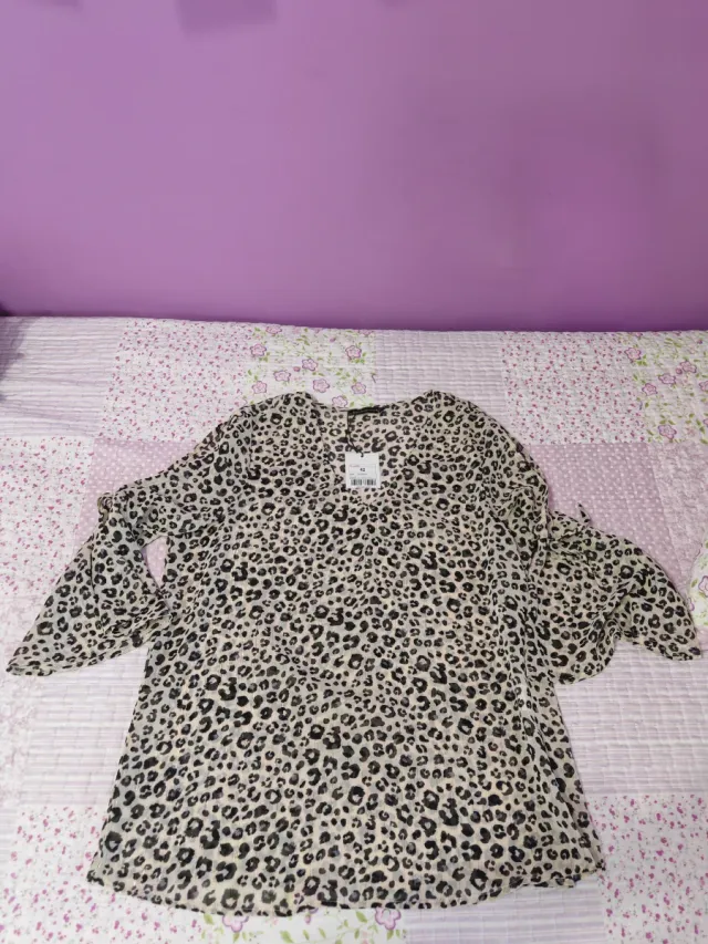 Blusa estampado leopardo beige y negro