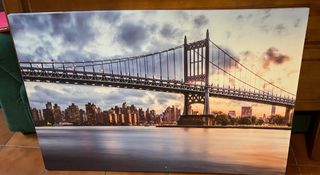Cuadro lienzo Puente y Ciudad al Atardecer