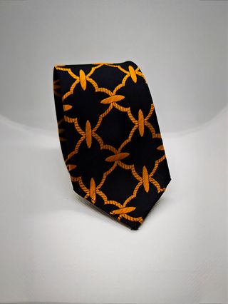 Corbata negra con diseño naranja
