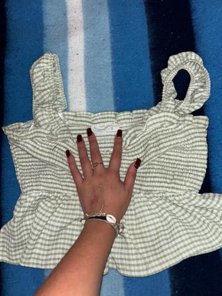 Top verde con estampado de cuadros