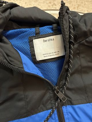 Chubasquero REFLECTED Negro y Azul