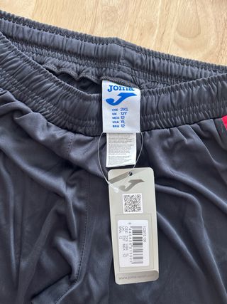 Equipación fútbol Joma roja y negra.