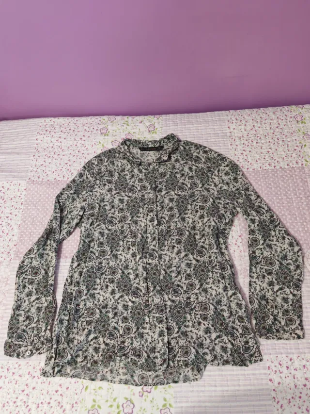 Blusa estampada manga larga