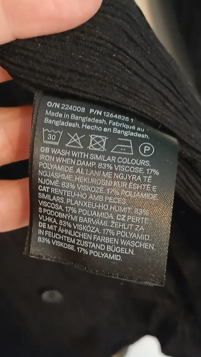 Camisa H&M plisada negra