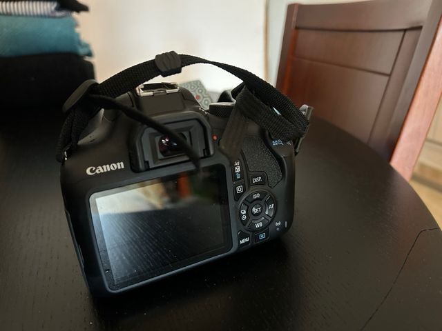 Canon EOS 1300D Fotocamera Nero con Borsa Regalo