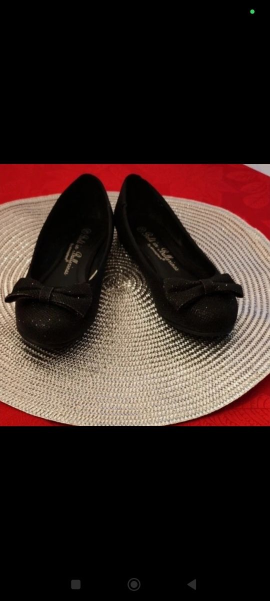 Bailarinas negras con lazo brillante