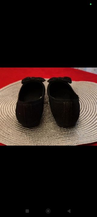 Bailarinas negras con lazo brillante