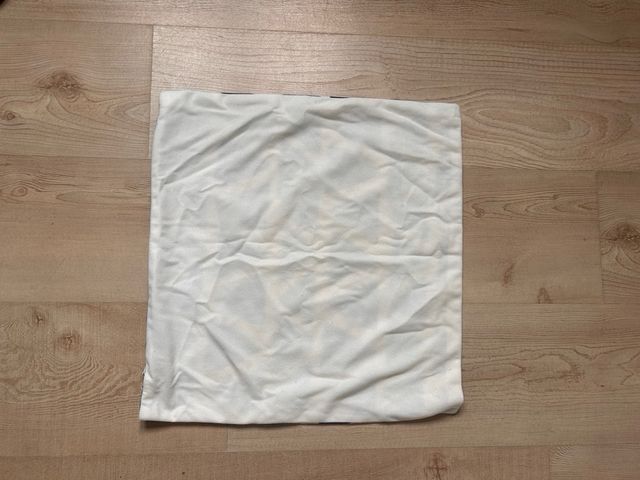 Capas de almofada com triângulos azuis