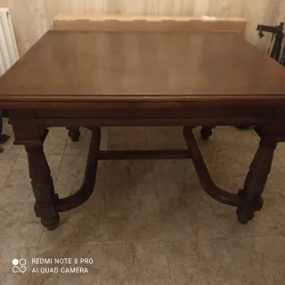 Mesa de comedor antigua de madera extensible