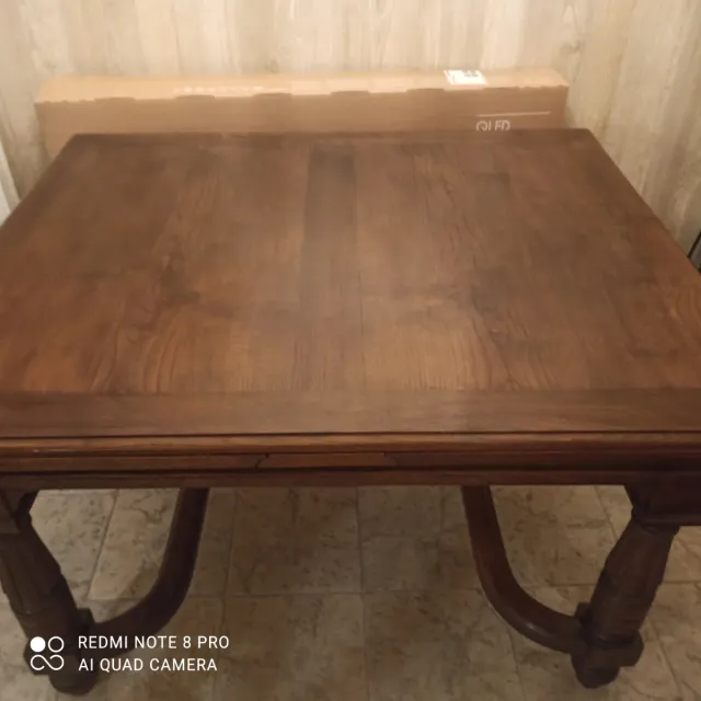 Mesa de comedor antigua de madera extensible