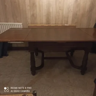 Mesa de comedor antigua de madera extensible