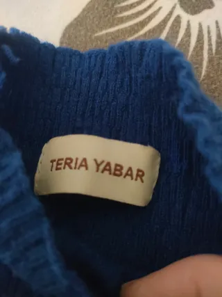 Jersey azul con mangas acampanadas