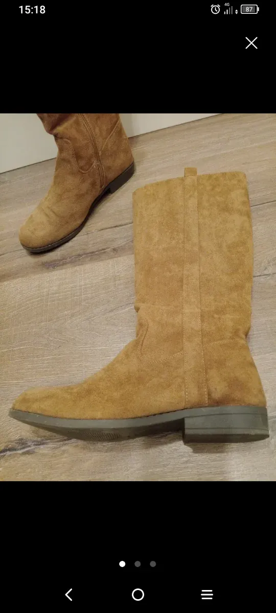 Botas altas ante marrón