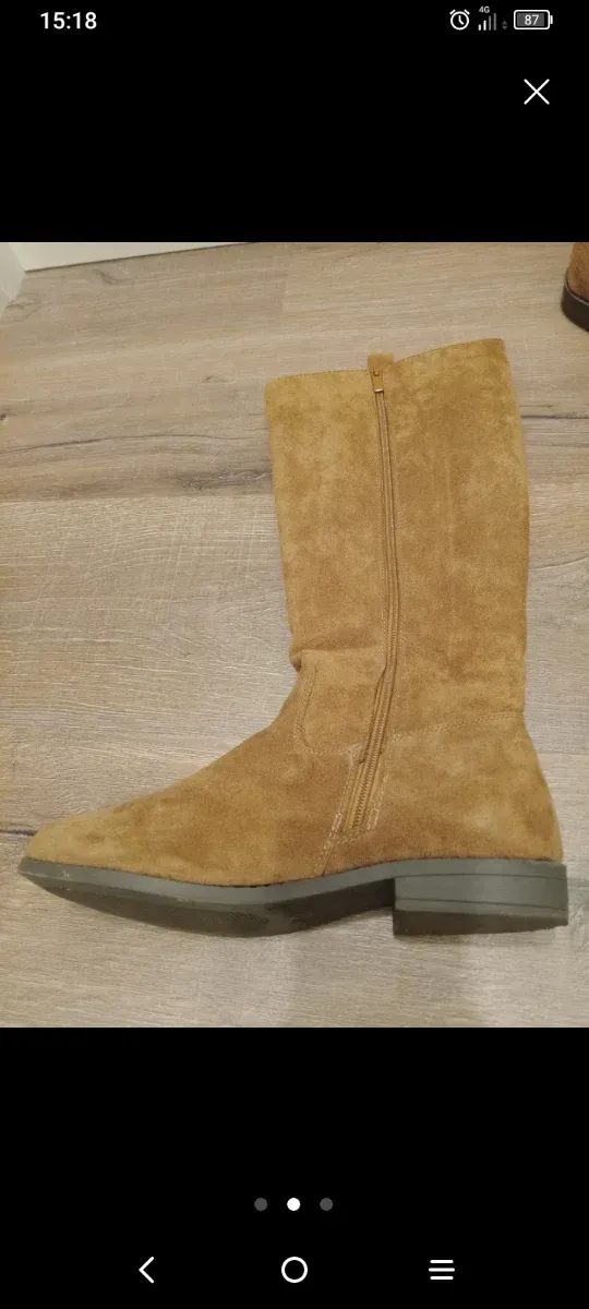 Botas altas ante marrón