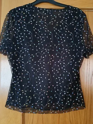 Top fiesta lentejuelas negro manga corta