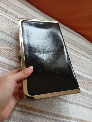 Bolso de fiesta elegante negro y dorado