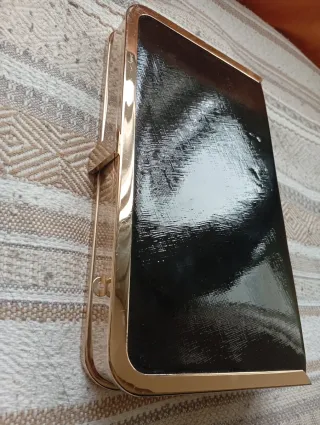 Bolso de fiesta elegante negro y dorado