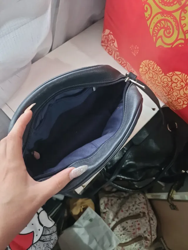 Bolso negro acolchado