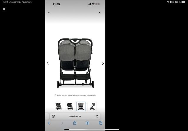 Silla gemelar gris capotas independientes.