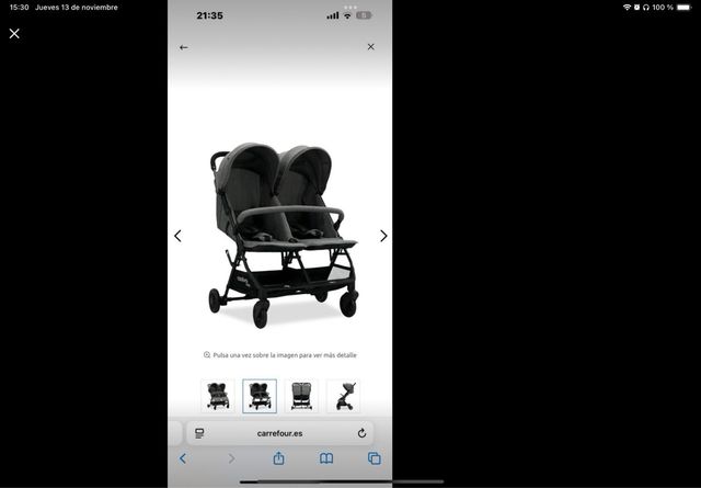 Silla gemelar gris capotas independientes.