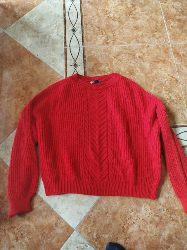 Jersey de punto gris con cuello alto