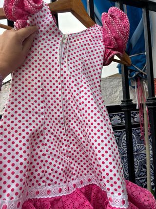 Traje de flamenca rosa y blanco