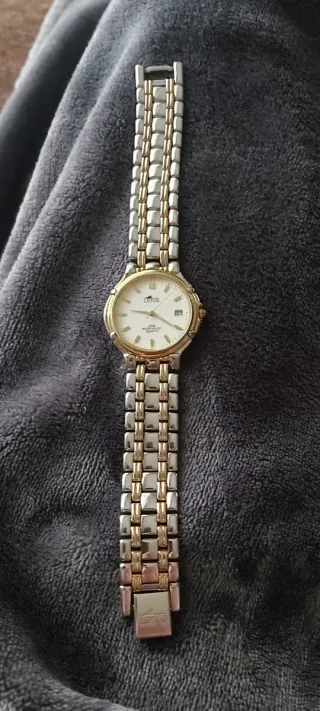 Reloj Lotus bicolor dorado y plateado