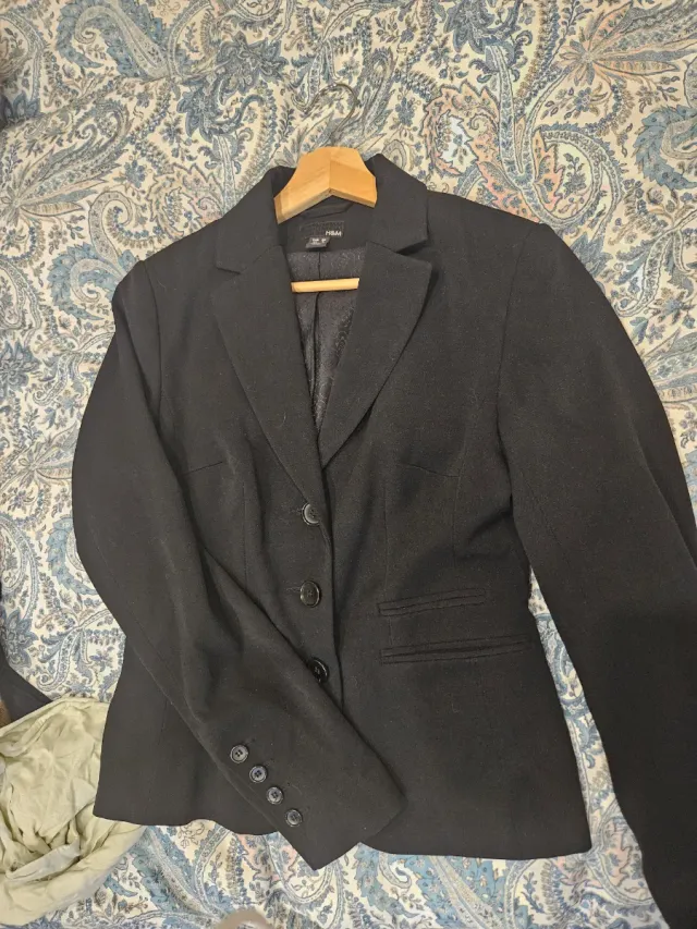 Blazer negro entallado Da forma en la cintura