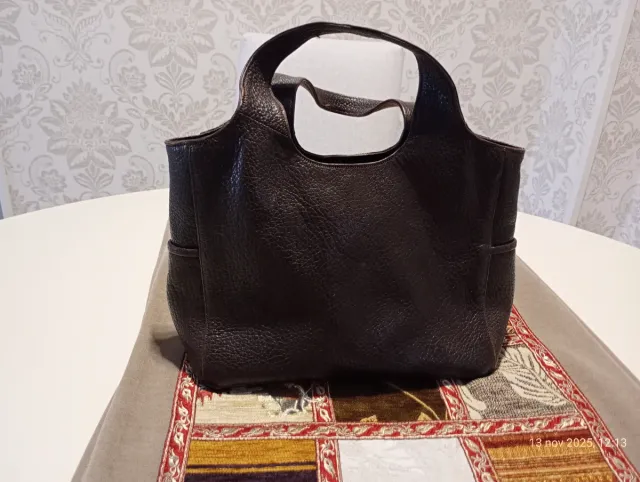 Bolso de mano de piel marrón ( no sintético)