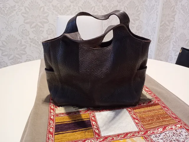 Bolso de mano de piel marrón ( no sintético)
