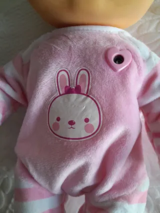 Bambola neonata con pigiamino rosa