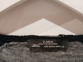 Top Zara gris con encaje negro