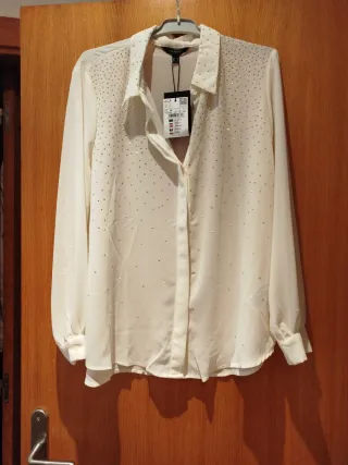 Blusa fiesta con pedrería Talla M