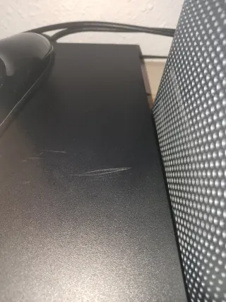 Consola PS4 + FIFA 26 y otros juegos más.