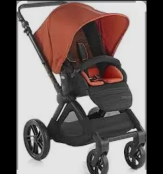 Carro de bebé completo naranja y negro