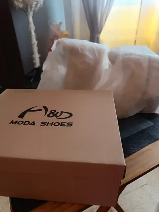 Botines beige con cremallera