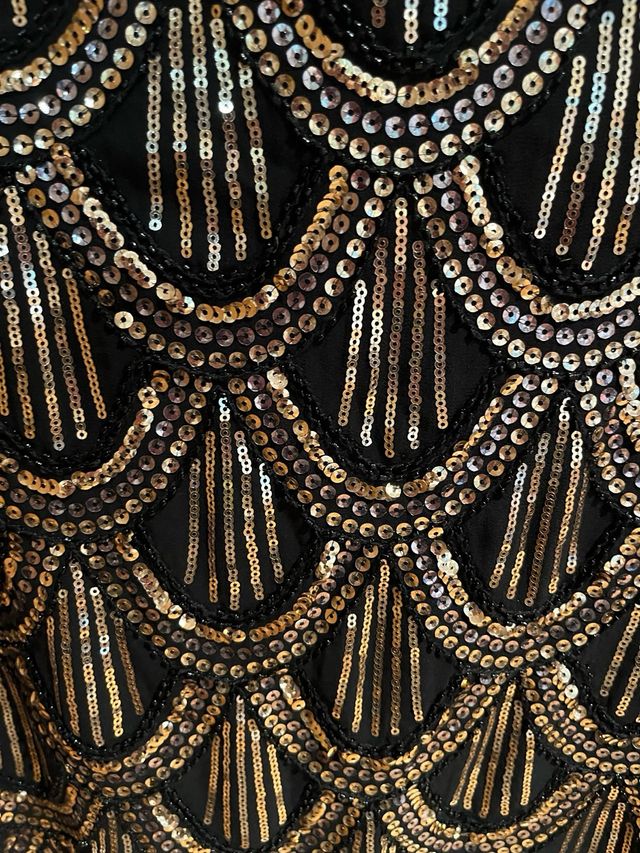 Falda de lentejuelas negra y dorada